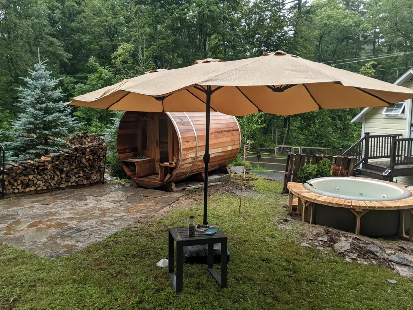 Woodstock backyard with sauna and outdoor seating